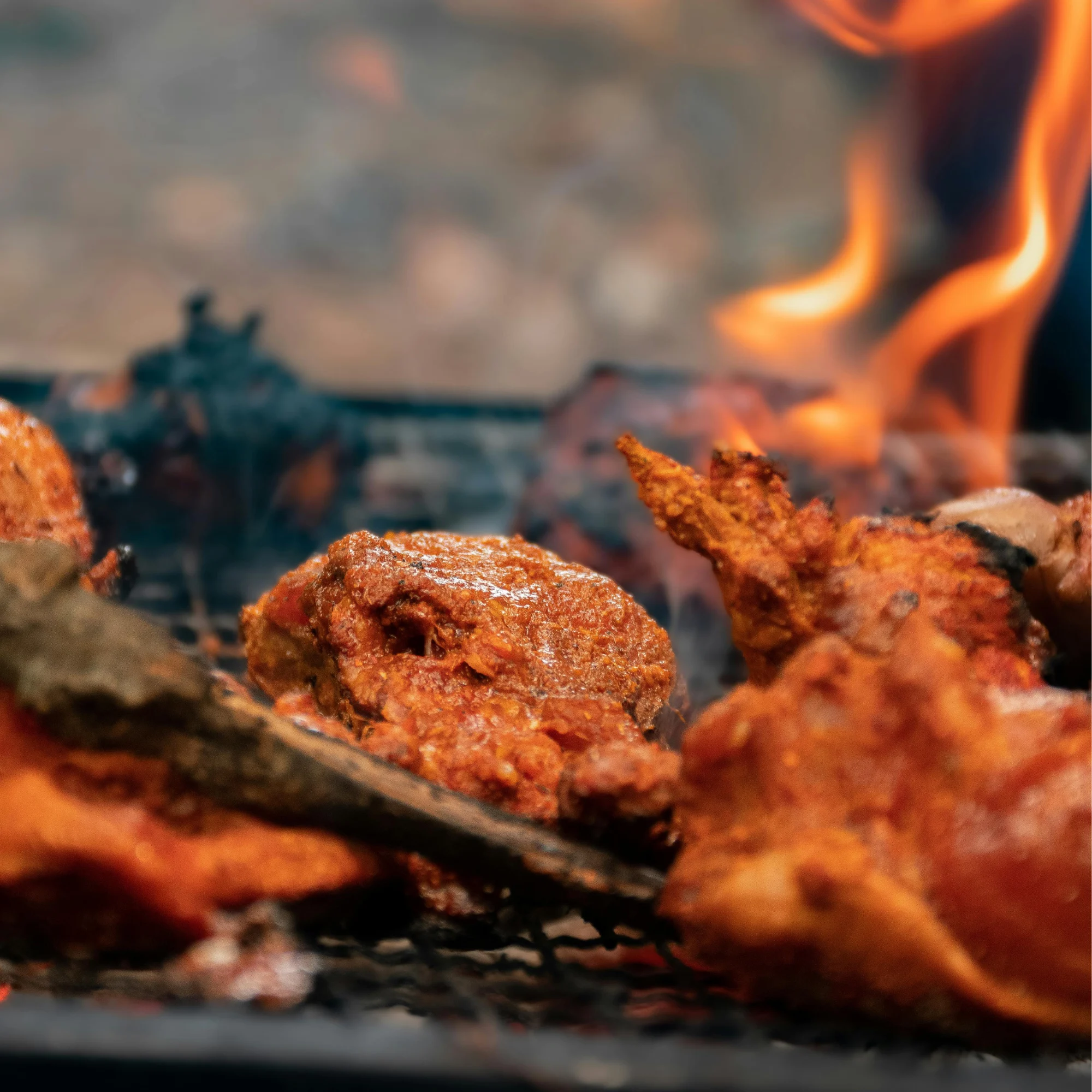 marinated meats on the grill